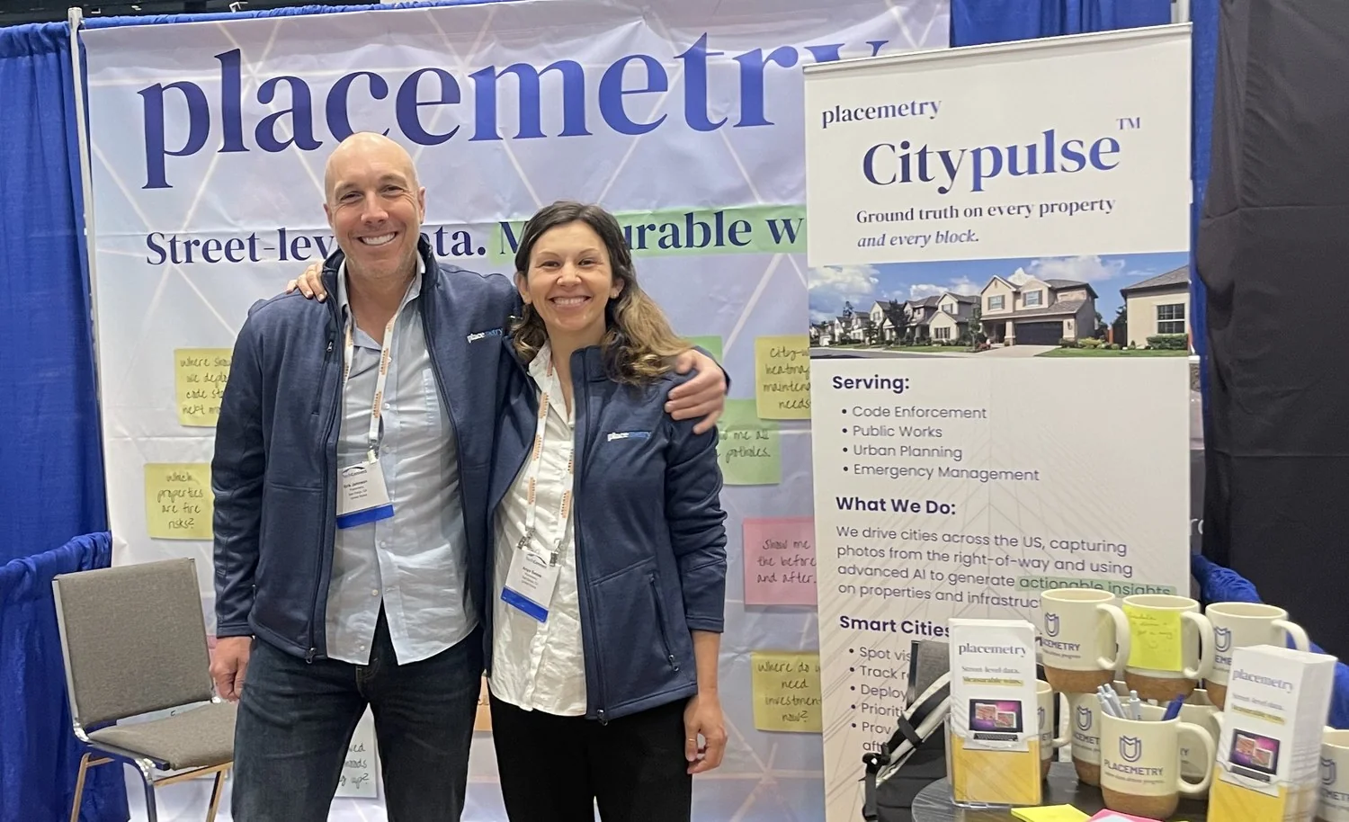 Placemetry co-founders Erik Johnson and Anya Samek at their booth