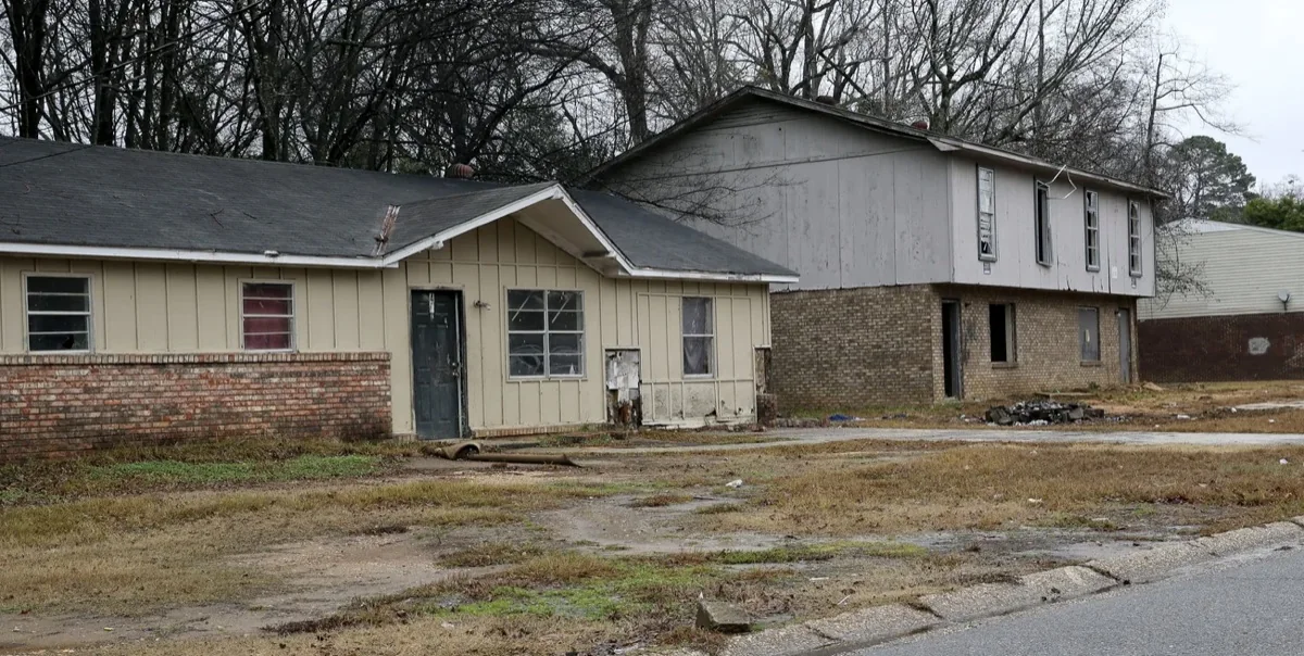 Blighted houses on a residential street in Tuscaloosa